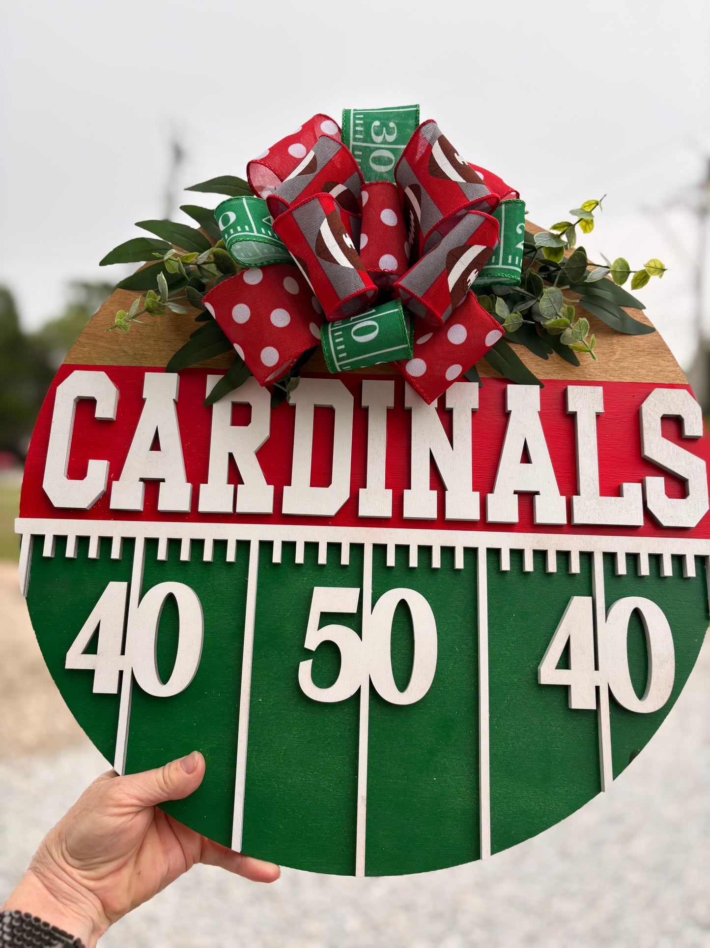 Football yardage mascot door hanger