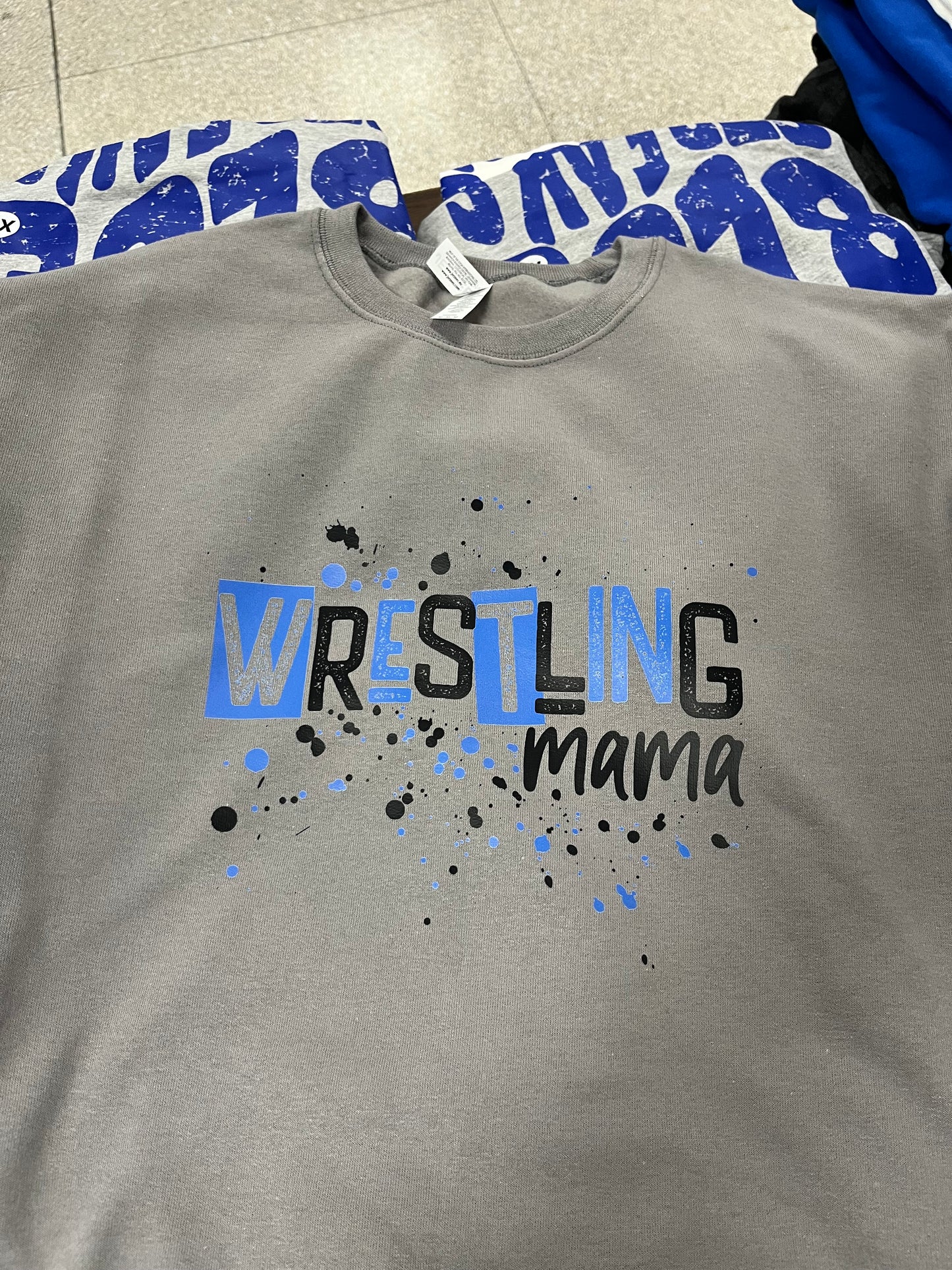Wrestling mama (more titles available) paint splatter crew sweatshirt