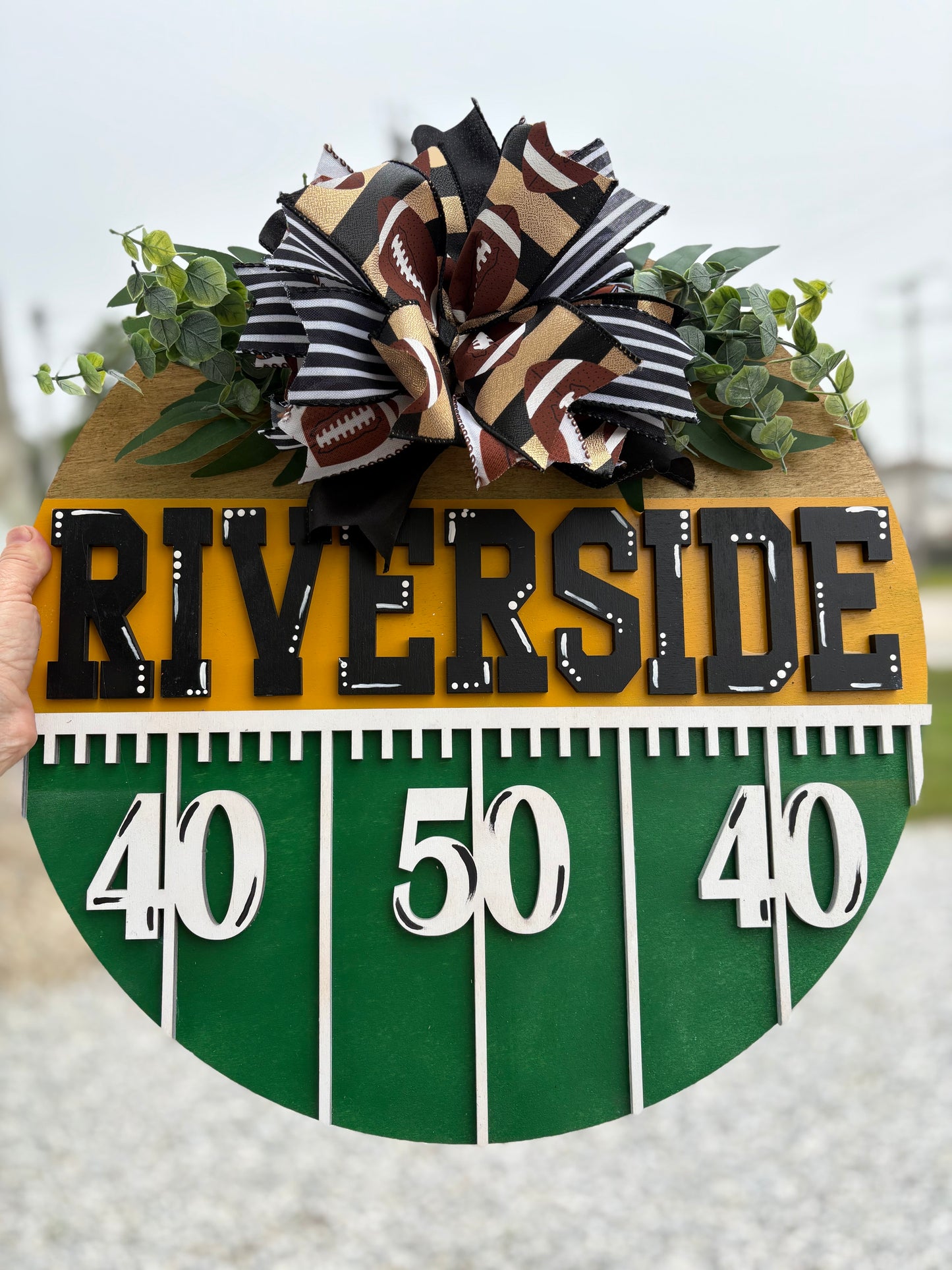 Football yardage mascot door hanger
