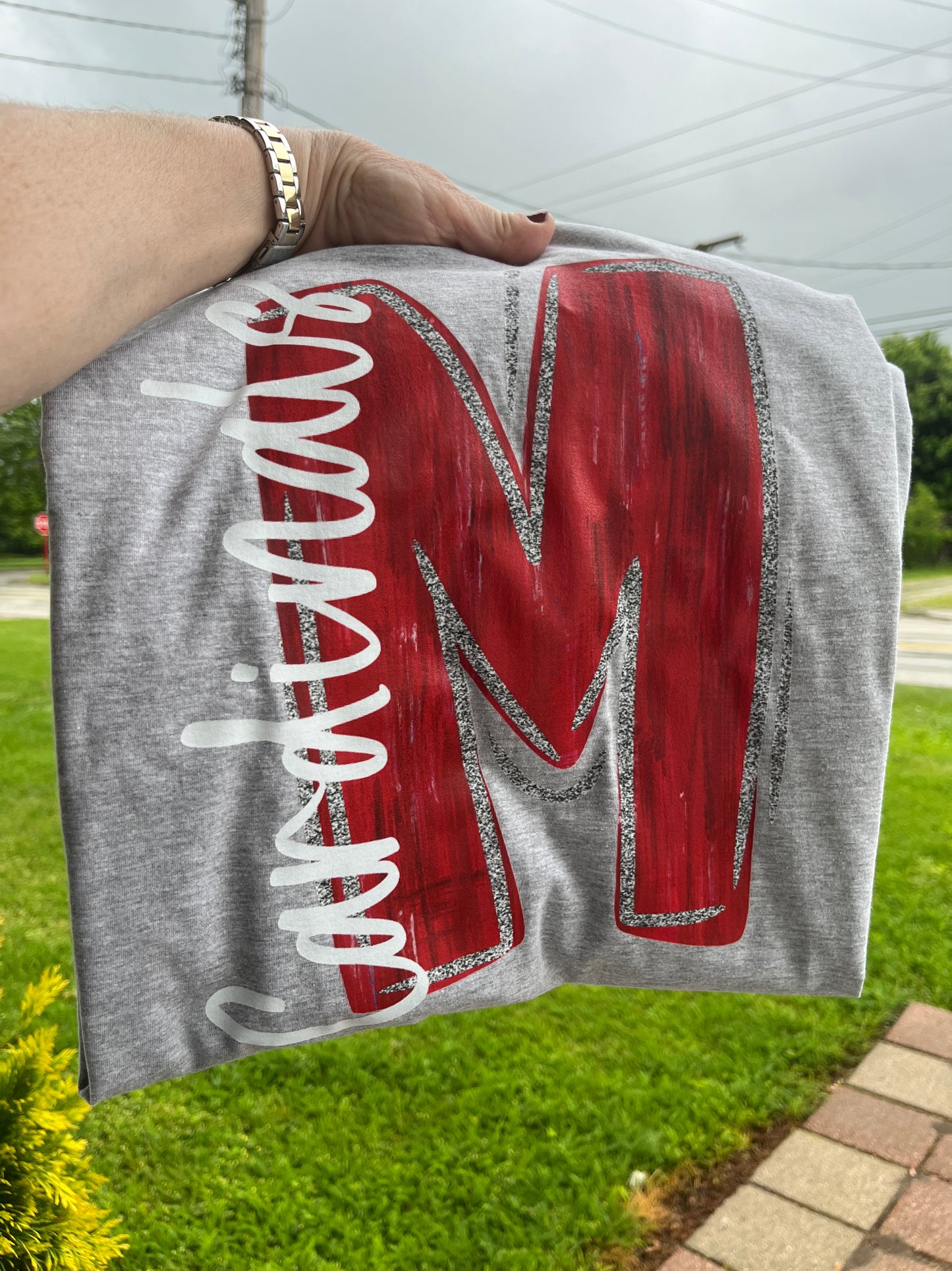 Painted letter mascot