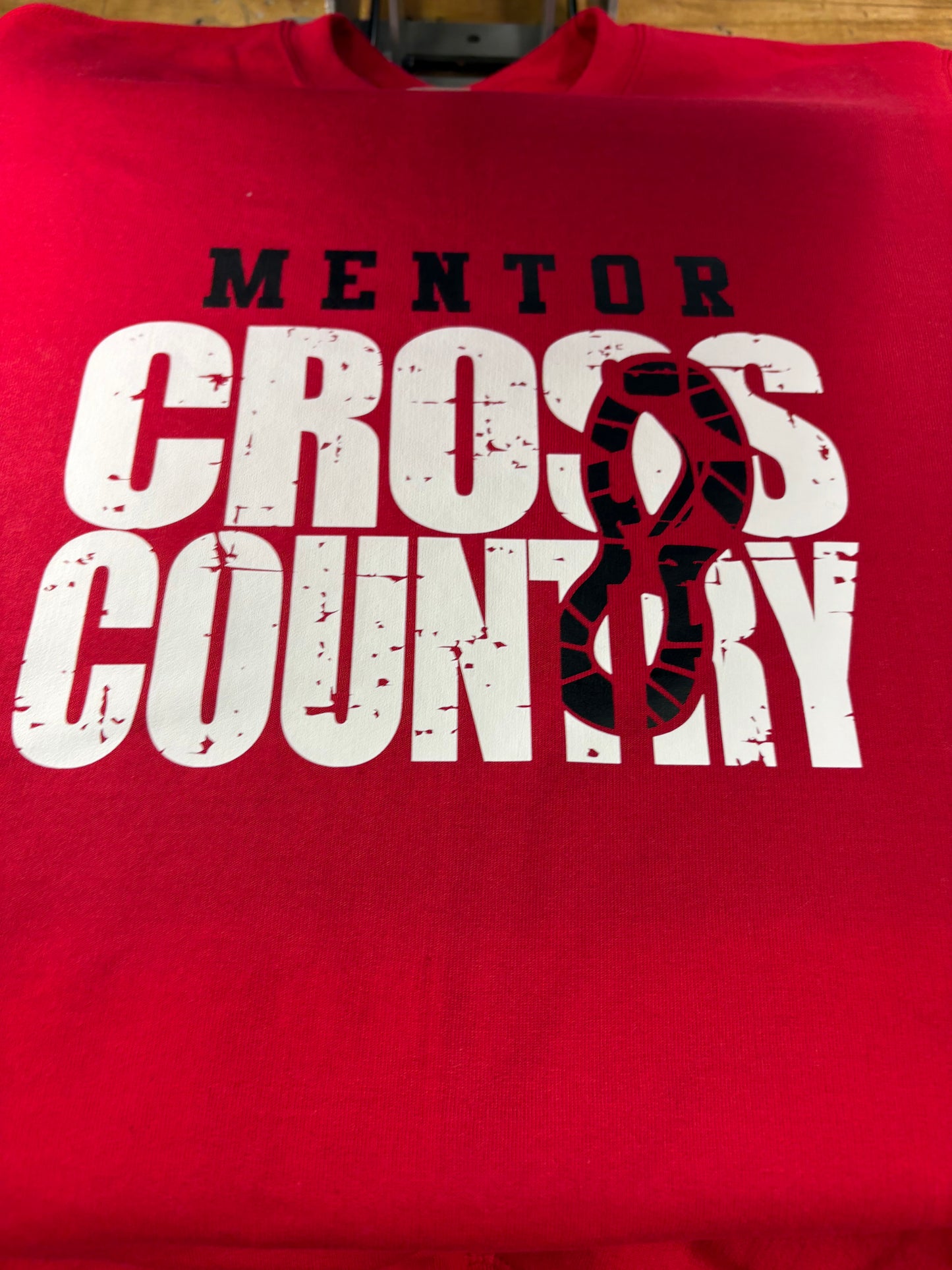 Distressed with shoe cross country